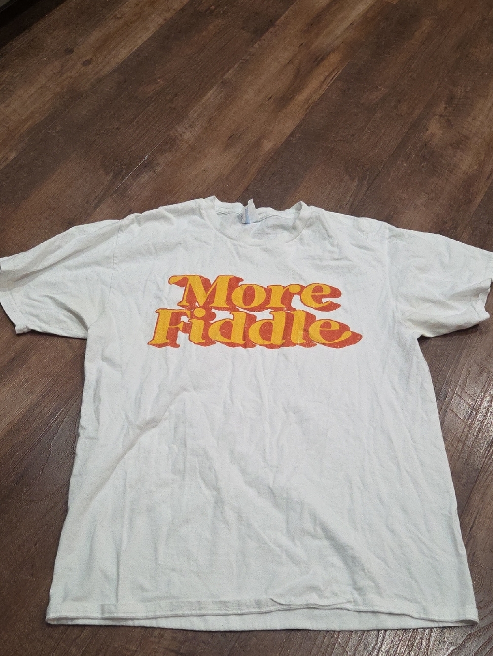 More Fiddle Graphic Tee – White with Orange/Yellow Print